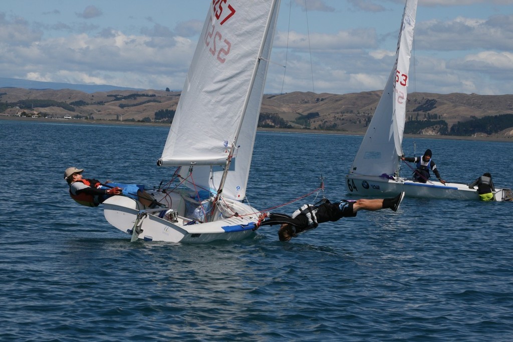 Brad Moss demonstrates his new trapezing style in the VW print 420 Nationals at Napier © Marty Weeks